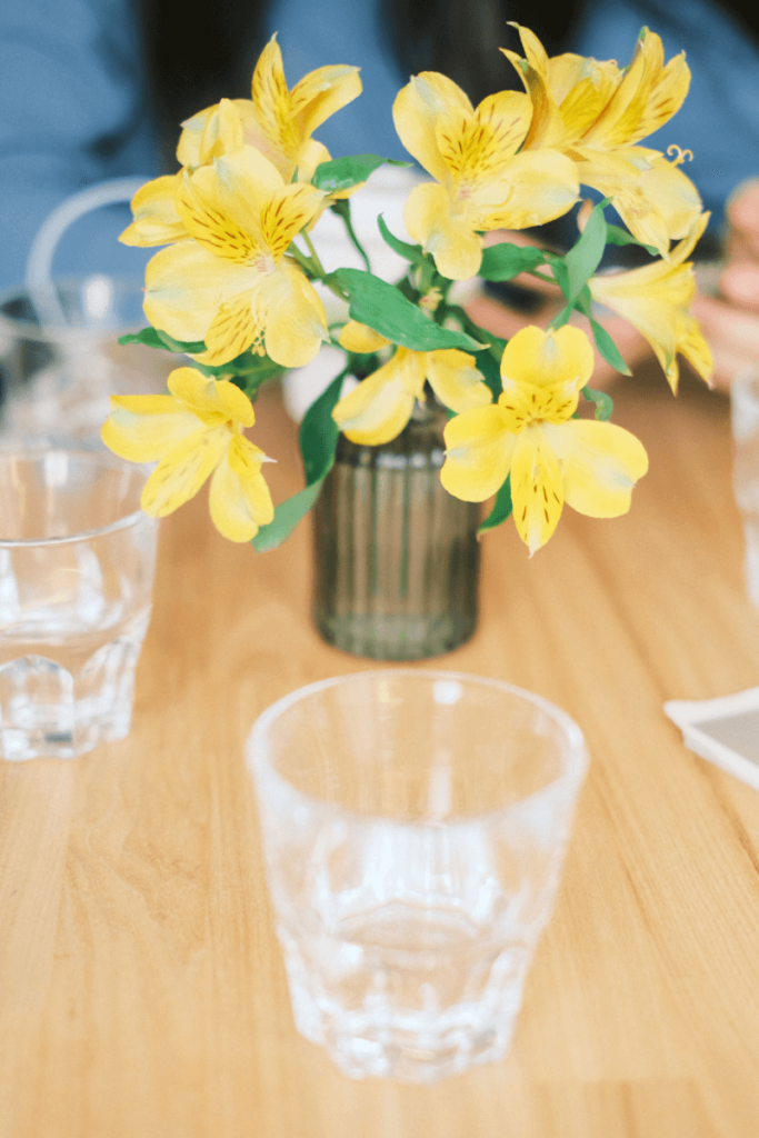 image - pretty spring flowers in a vase for ceremony by tatiana briday unsplash